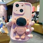 For iPhone 15 Astronaut 3D Relief Holder TPU + PC Full Coverage Phone Case(Pink) - 1