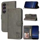 For Sony Xperia 1 VII Embossed Happy Cat Pattern Flip Leather Phone Case(Grey) - 1