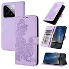 For Xiaomi 14 Datura Flower Embossed Flip Leather Phone Case(Purple) - 1