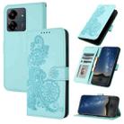 For Xiaomi Redmi 13C Datura Flower Embossed Flip Leather Phone Case(Light blue) - 1