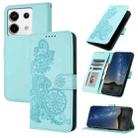 For Xiaomi Redmi Note 13 Pro 4G Datura Flower Embossed Flip Leather Phone Case(Light blue) - 1