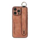 For iPhone 15 Pro Lambskin Wristband Holder Phone Case(Khaki) - 1