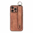 For iPhone 16 Pro Lambskin Wristband Holder Phone Case(Khaki) - 1