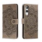 For Rakuten Hand 5G Sun Mandala Embossing Pattern Phone Leather Case(Brown) - 1