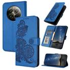 For Realme 12+ 5G Global Datura Flower Embossed Flip Leather Phone Case(Blue) - 1