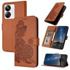 For Realme 10 Pro+ Datura Flower Embossed Flip Leather Phone Case(Brown) - 1