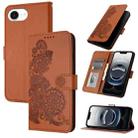 For iPhone 16e Datura Flower Embossed Flip Leather Phone Case(Brown) - 1