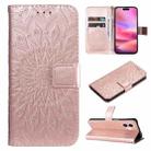 For iPhone 16 Embossed Sunflower Pattern Flip Leather Phone Case(Rose Gold) - 1