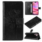 For iPhone 16 Tree & Cat Embossed Pattern Flip Leather Phone Case(Black) - 1