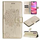 For iPhone 16 Tree & Cat Embossed Pattern Flip Leather Phone Case(Gold) - 1