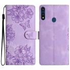 For Motorola Moto E 2020 Cherry Blossom Butterfly Skin Feel Embossed PU Phone Case(Purple) - 1