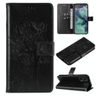 For Motorola Moto G35 Tree & Cat Embossed Pattern Flip Leather Phone Case(Black) - 1