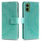 For Motorola Moto G35 Totem Flower Embossed Leather Phone Case with Lanyard(Green) - 1