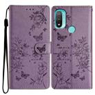 For Motorola Moto E20 / E30 Butterflies and Flowers Leather Phone Case(Purple) - 1