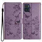 For Motorola Moto E22 Butterflies and Flowers Leather Phone Case(Purple) - 1