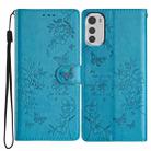 For Motorola Moto E32 Butterflies and Flowers Leather Phone Case(Blue) - 1