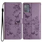 For Motorola Moto G50 Butterflies and Flowers Leather Phone Case(Purple) - 1