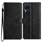 For Samsung Galaxy M33 Butterflies and Flowers Leather Phone Case(Black) - 1