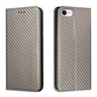 For iPhone 16e Carbon Fiber Texture Magnetic Flip Leather Phone Case(Grey) - 1