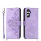 For Samsung Galaxy M35 Skin Feel Flowers Embossed Wallet Leather Phone Case(Purple) - 1