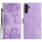 For Samsung Galaxy A16 5G Cherry Blossom Butterfly Skin Feel Embossed PU Phone Case(Purple) - 1