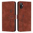 For Samsung Galaxy F06 5G / M06 5G Skin Feel Heart Embossed Leather Phone Case with Long Lanyard(Brown) - 1