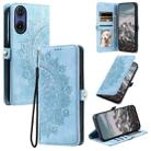 For Motorola Moto G85 Skin Feel Totem Embossed Leather Phone Case(Blue) - 1