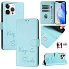 For iPhone 14 Pro Max Smile Embossing RFID Leather Phone Case(Mint Green) - 1