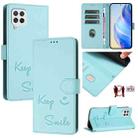 For Samsung Galaxy A22 4G Smile Embossing RFID Leather Phone Case(Mint Green) - 1