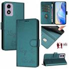 For Motorola Moto E14 Smile Embossing RFID Leather Phone Case(Peacock Green) - 1