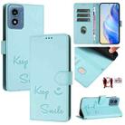 For Motorola Moto G Play 4G 2024 Global Smile Embossing RFID Leather Phone Case(Mint Green) - 1