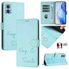 For Motorola Moto E22 4G/E22i 4G Smile Embossing RFID Leather Phone Case(Mint Green) - 1