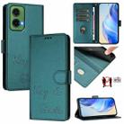 For Motorola Moto G35 Smile Embossing RFID Leather Phone Case(Peacock Green) - 1