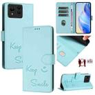 For Asus Zenfone 11 Ultra Smile Embossing RFID Leather Phone Case(Mint Green) - 1