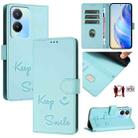 For vivo Y56 5G Global Smile Embossing RFID Leather Phone Case(Mint Green) - 1