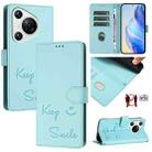 For Huawei Pura 70 Smile Embossing RFID Leather Phone Case(Mint Green) - 1