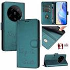 For Xiaomi 14 Ultra Smile Embossing RFID Leather Phone Case(Peacock Green) - 1