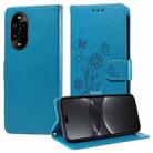 For Huawei nova 13 Pro Embossed Butterfly Flowers Leather Phone Case(Blue) - 1