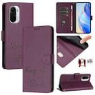 For Redmi K40 / K40 Pro Smile Embossing RFID Leather Phone Case(Violet) - 1