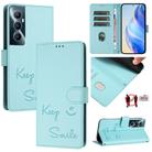 For Realme C65 4G Global Smile Embossing RFID Leather Phone Case(Mint Green) - 1