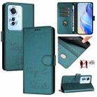 For OPPO F25 Pro 5G India Smile Embossing RFID Leather Phone Case(Peacock Green) - 1