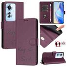 For OPPO F25 Pro 5G India Smile Embossing RFID Leather Phone Case(Violet) - 1