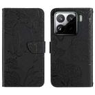 For Xiaomi 15 Skin Feel Butterfly Embossed Flip Leather Phone Case(Black) - 1