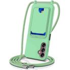 For Samsung Galaxy S24 FE 5G Integrated Card Bag Solid Color Liquid Silicone Phone Case with Lanyard(Green) - 1