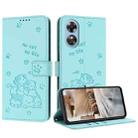 For OPPO A17 4G Global Embossed Kitten Phone Leather Case with Lanyard(Mint Green) - 1