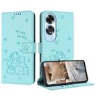 For OPPO A60 4G Global Embossed Kitten Phone Leather Case with Lanyard(Mint Green) - 1