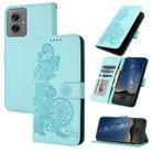 For Motorola Moto G55 Datura Flower Embossed Flip Leather Phone Case(Light Blue) - 1