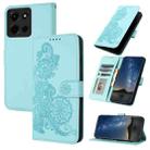 For Motorola Moto G 2025 Datura Flower Embossed Flip Leather Phone Case(Light Blue) - 1