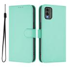 For Nokia C32 Skin Feel Solid Color Leather Phone Case with Lanyard(Mint Green) - 2