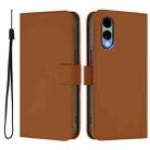 For Fujitsu Arrows We2 / F-52E Skin Feel Solid Color Leather Phone Case with Lanyard(Brown) - 2